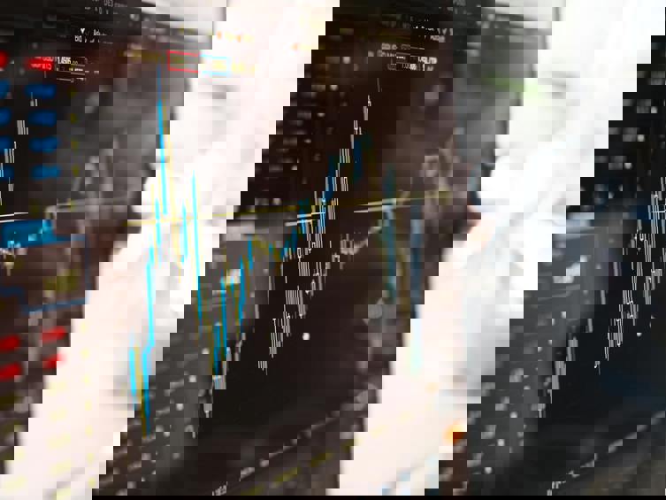 Computer screen with graph showing ups and downs